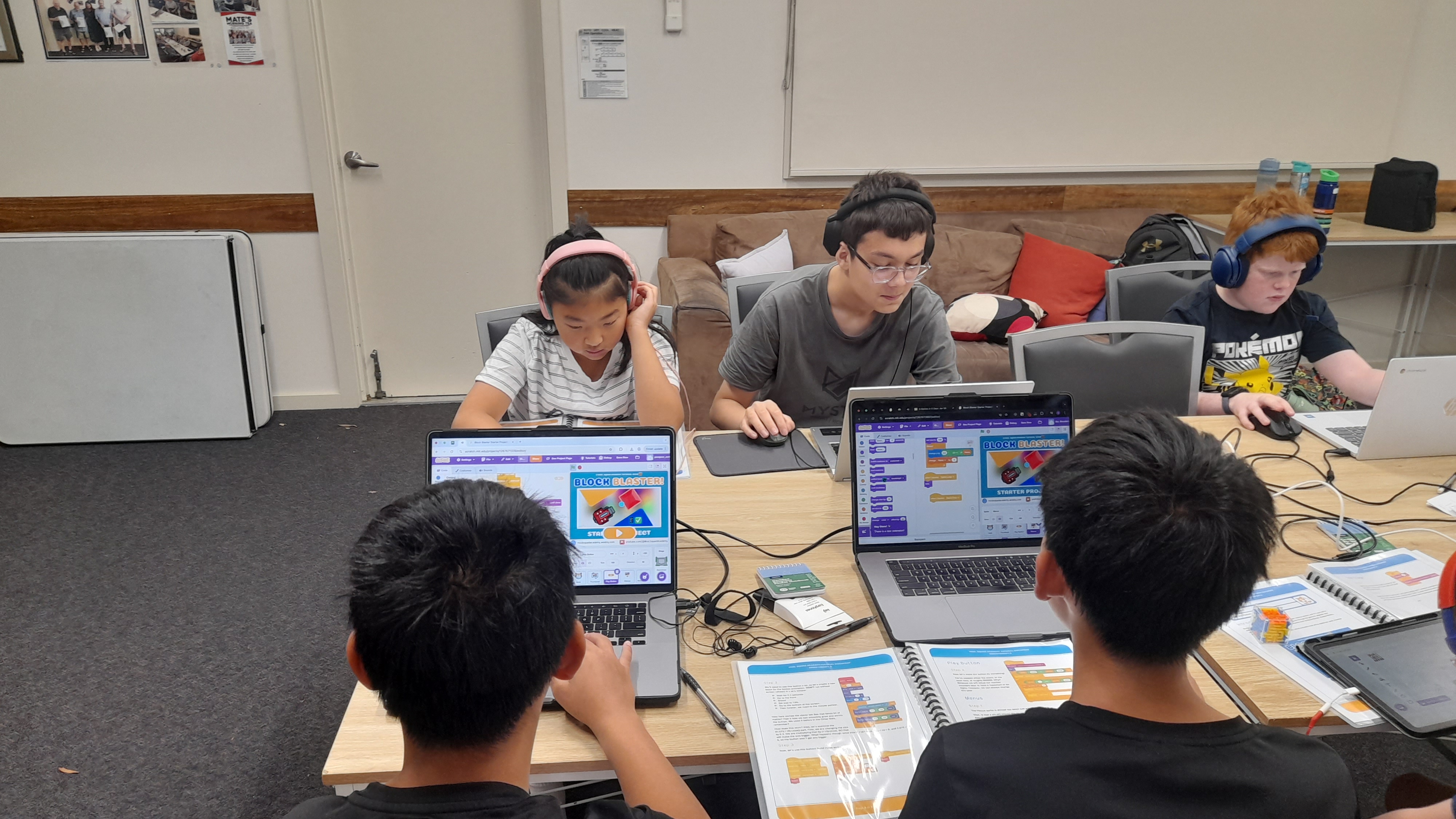 Students coding inside classroom